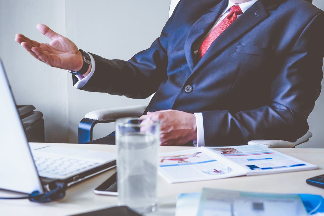 negative-space-thumb-man-business-talking-desk-1
